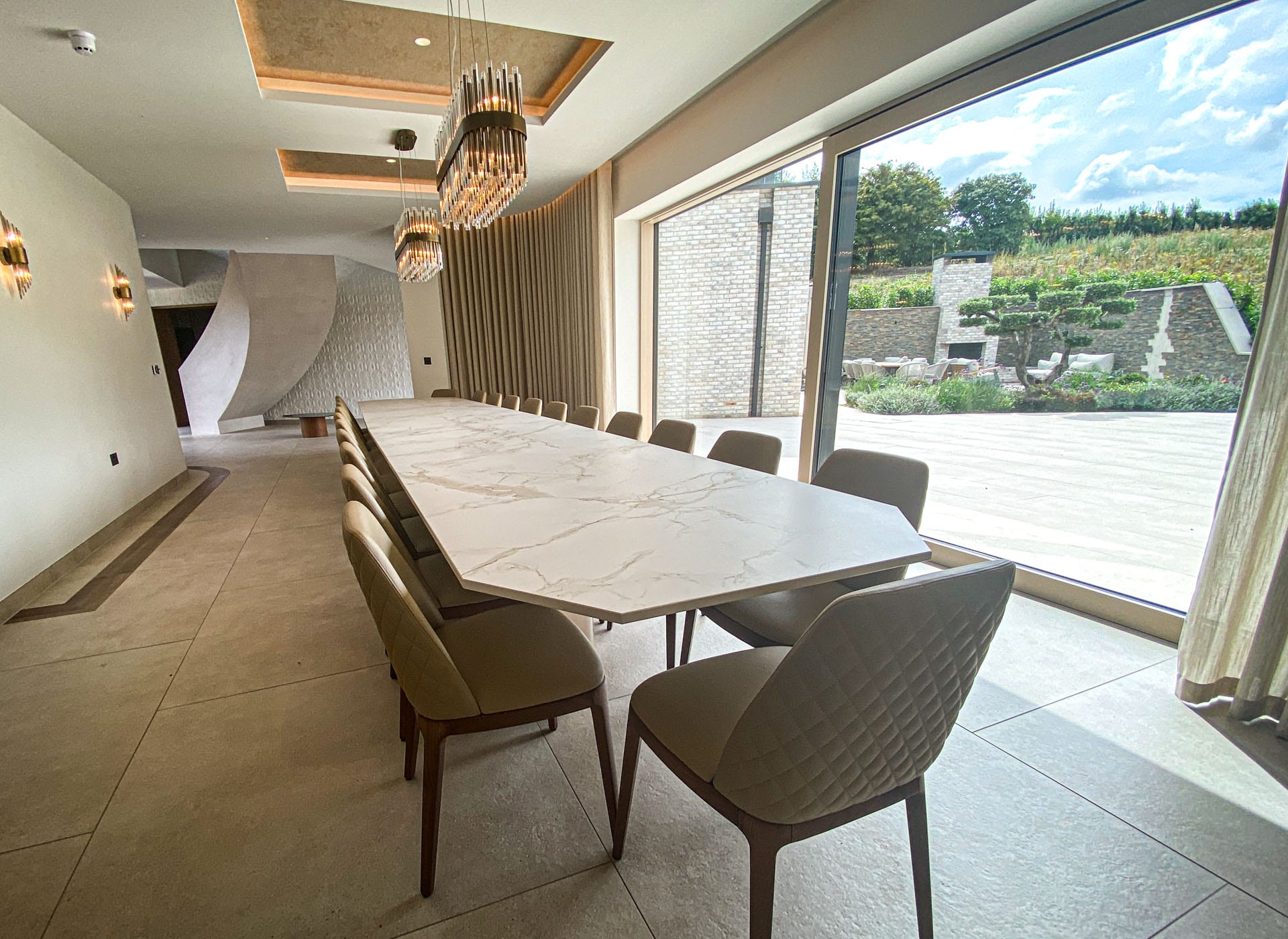 Custom design dining table with a 6400 x 1200mm Entzo Dekton top, project 2946: Seats twenty-two