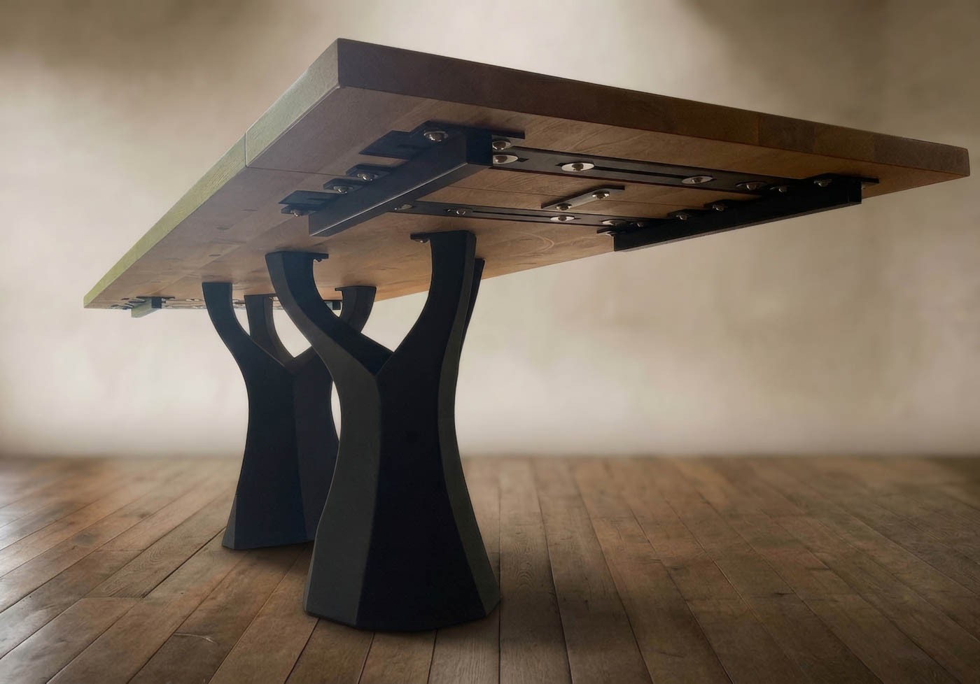 Solid extension leaf in place on the steel supports of the extending table