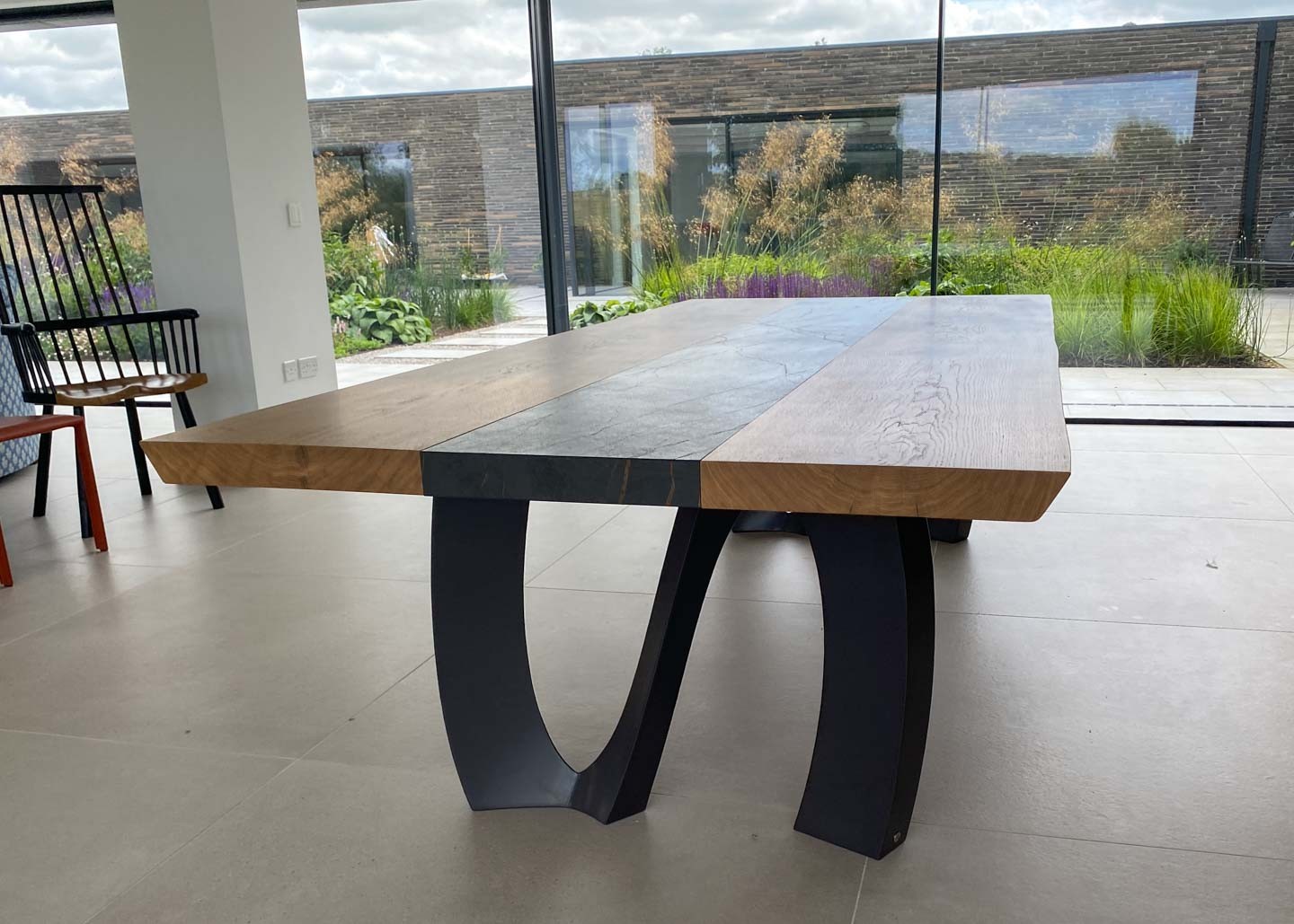 extra large oak and dekton dining table on sculpted black legs 12 Seater 2639 image 4