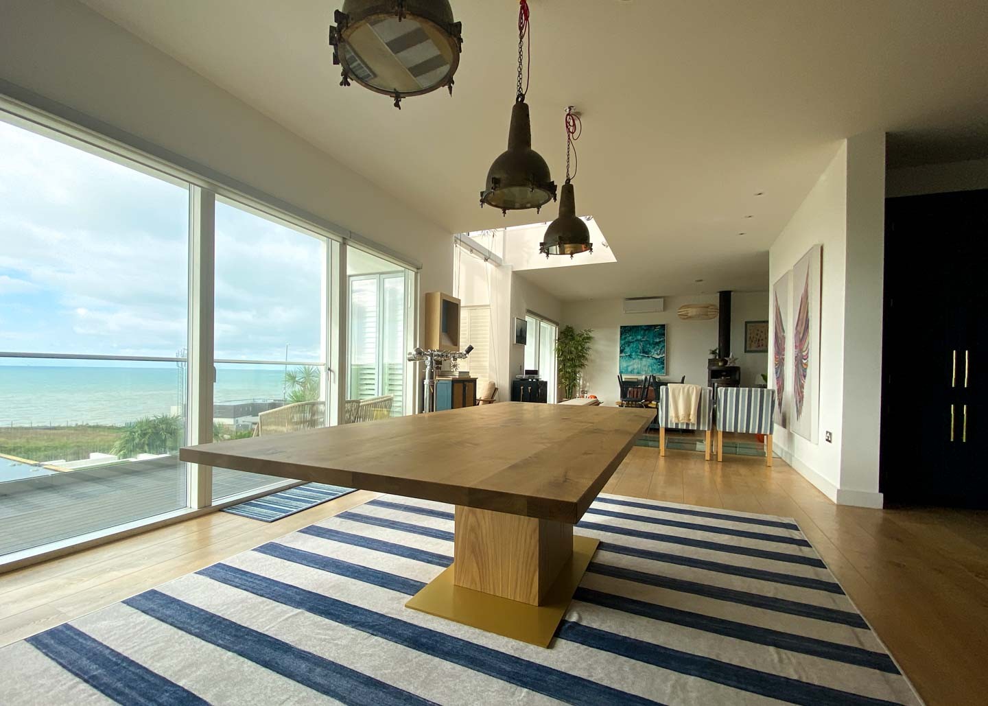 large oak dining table with central gold oak leg 10 Seater 2755 image 3
