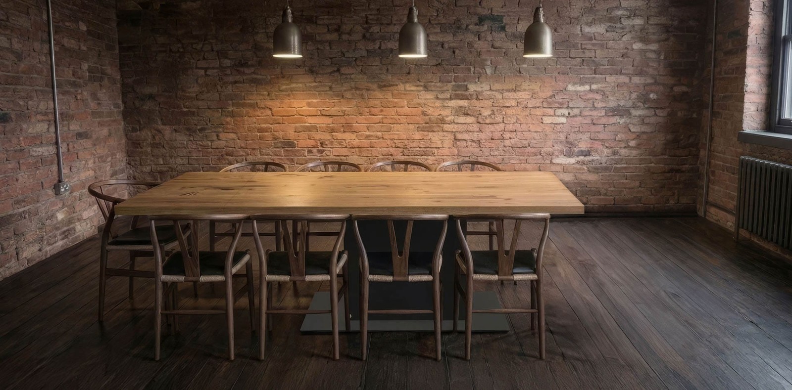 The same oak dining table with one extension leaf fitted, seating eight