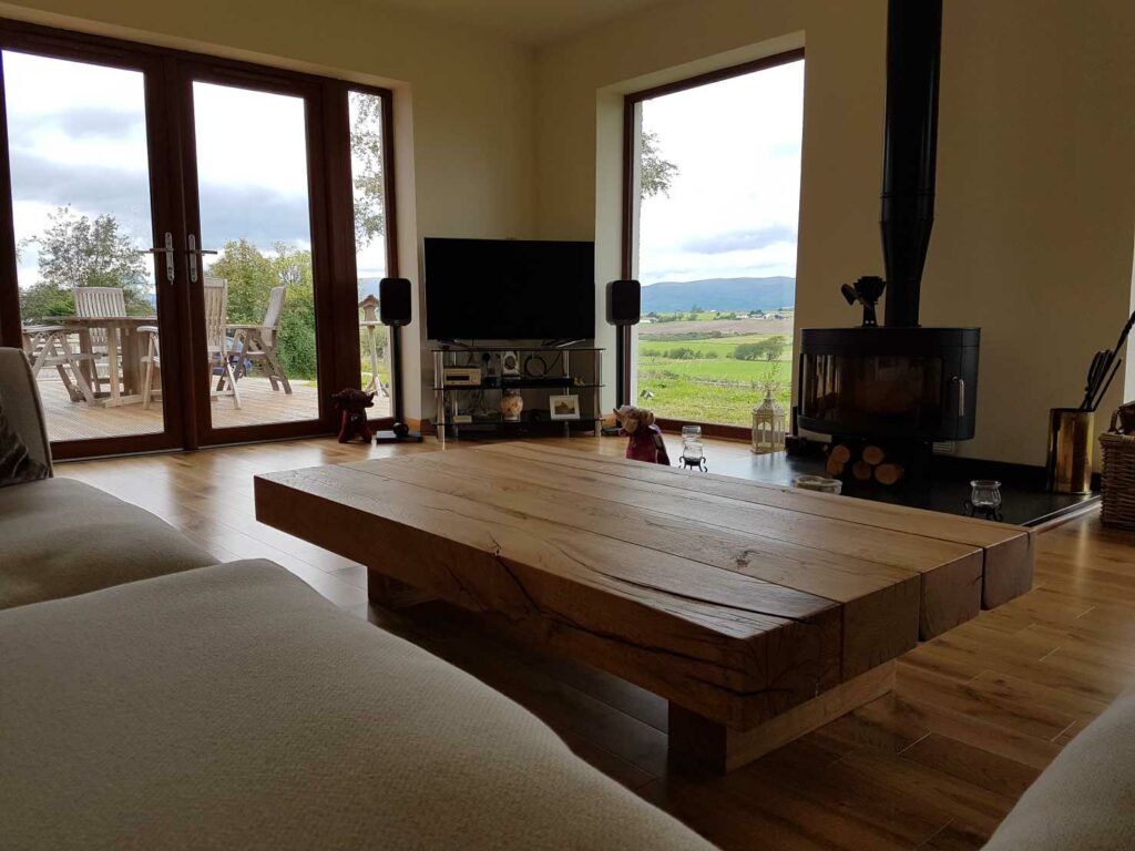 rustic-oak-beam-coffee-table-made-in-the-uk-from-abacus-tables-1.5m-floating-style-project-405